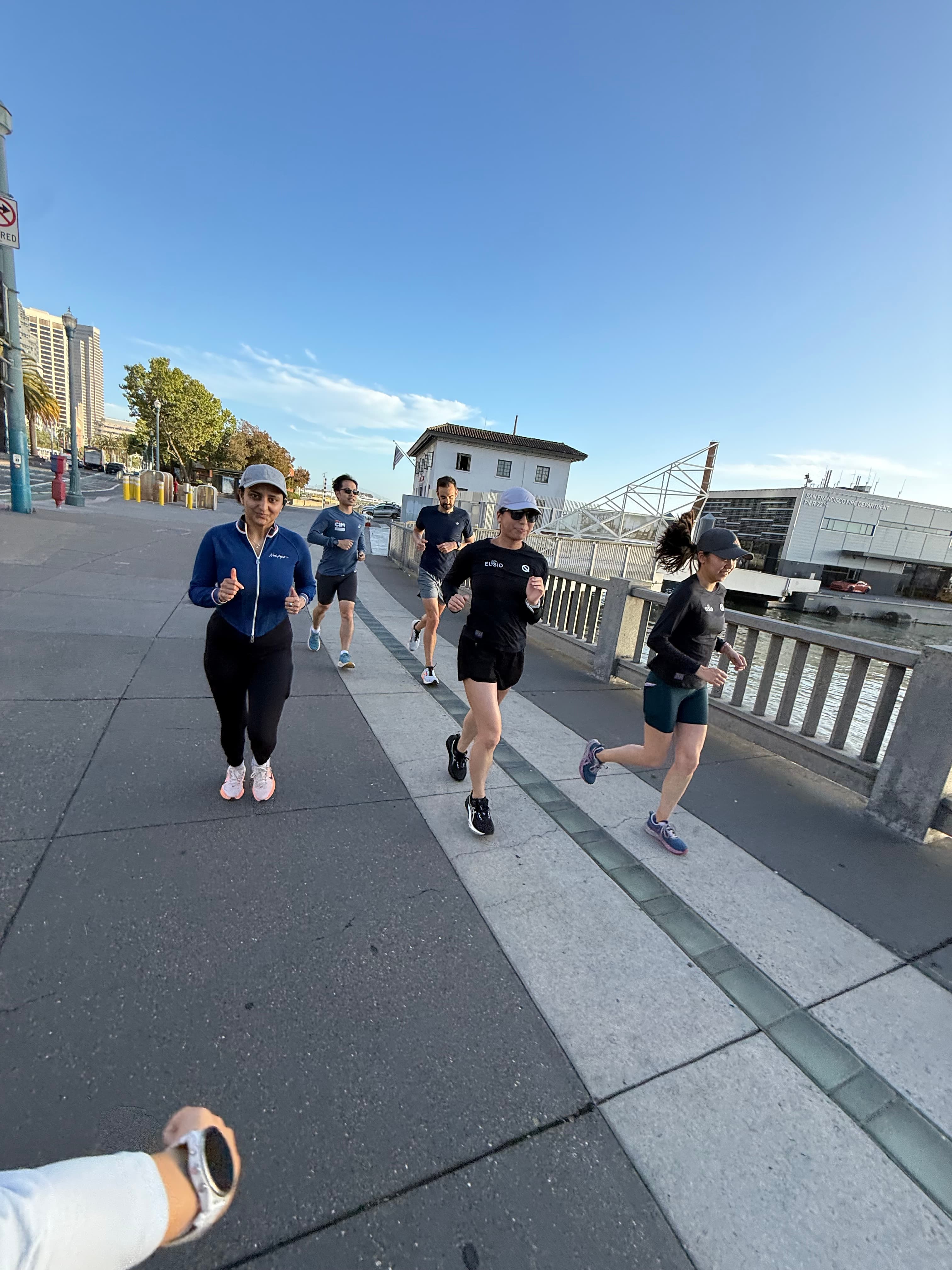 Crew running along the Embarcadero
